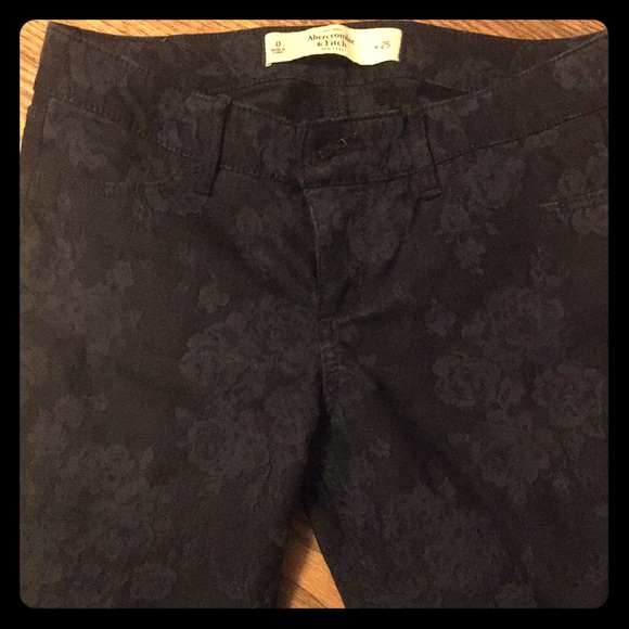 Dark blue skinny jeans with same color flowers - Picture 1 of 3